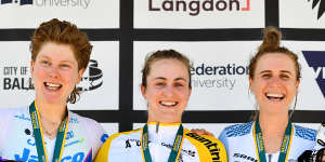 Grace Brown,centre,on the podium with silver medalist Georgie Howe,left,and bronze medalist Brodie Chapman. 