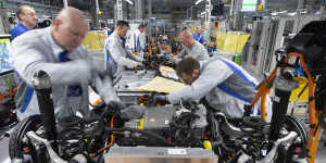 An electric car body is assembled at a Volkswagen plant in Zwickau,Germany.