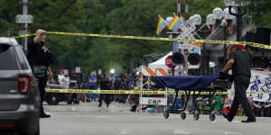 A stretcher is seen after a mass shooting at the Highland Park Fourth of July parade.