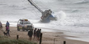 Yacht stranded on Wanda Beach after crew loses control in wild winds