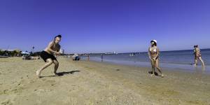Melburnians enjoying the sunshine at St Kilda beach on Easter Saturday.