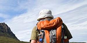 High road ... hikers climb Cradle Mountain.