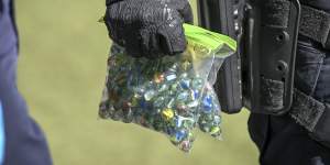 Marbles,hockey stick and paint seized as police extend search powers outside arms expo