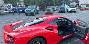 Police seize Ferrari,luxury vehicles in $5.5 million fraud investigation