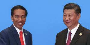 Indonesia’s President Joko Widodo has accepted a Chinese offer to resurface a sunken submarine and allowed joint military exercises between the nations’ navies. He is pictured here with Chinese President Xi Jinping in 2017. 