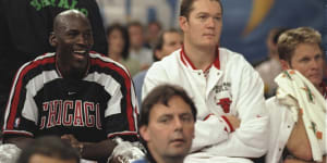 Michael Jordan and Luc Longley watch the action from the Chicago bench during match between the Bulls and Olympiakos in Paris in 1997.