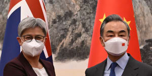Foreign Affairs Minister Penny Wong with Chinese counterpart Wang Yi in Beijing in December. 