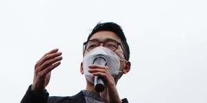 Exiled Hong Kong pro-democracy activist Nathan Law addresses a rally near Tower Bridge,London,in October.