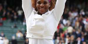 Serena Williams with her 2012 Wimbledon plate.