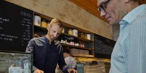 Cafe manager Chris Tate has reaped the benefits of turning his business into a cashless operation.