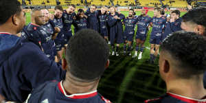 The Rebels form a huddle at the end of their final Super Rugby game.