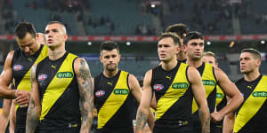 The dejected Tigers leave the field after the loss to the Bulldogs early in 2023.