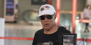 Charlie Teo was spotted at Sydney Airport on Thursday,sporting a cap with the logo ‘Psycho:Eyes Wide Open’.