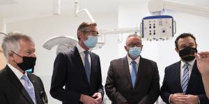 NSW Premier Dominic Perrottet,Health Minister Brad Hazzard and Minister for Western Sydney Stuart Ayres as well as the chairman of Nepean Hospital Peter Collins (far left) take a tour of the newly completed 14-storey clinical services building at the Nepean Hospital.