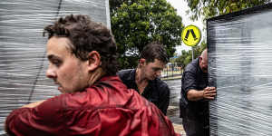 Intermittent heavy rainfall from Cyclone Alfred made for wet work for the employees of Brads Butchery in Lismore as they evacuated their workplace.