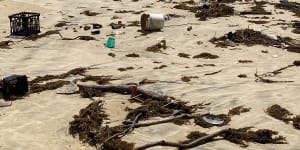 Flood flotsam hits 2 million pieces as cleaners storm the beaches