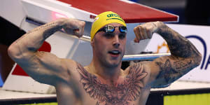 Kyle Chalmers celebrates winning gold in the 100m freestyle.