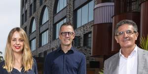 SJB architects Emily Wombwell and Adam Haddow with Allan Vidor (TOGA Group - developer). Surry Hills Shopping Centre has re-opened after being revamped with a new Coles supermarket,a Harris Farm and apartments. 