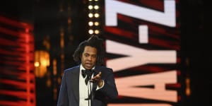 Jay-Z,Foo Fighters inducted into Rock&Roll Hall of Fame by Obama,Chappelle