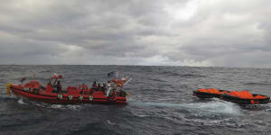 Cargo ship carrying 22 crew sinks off Japan,two rescued crew members die
