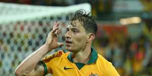 James Troisi celebrates after scoring for the Socceroos against Kuwait at the 2015 Asian Cup.