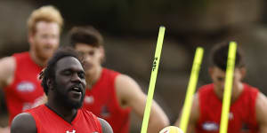 Anthony McDonald-Tipungwuti joined the Bombers’ first to fourth year players on the track.