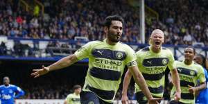 Manchester City’s Ilkay Gundogan celebrates after scoring his side’s opening goal during the English Premier League soccer match against Everton.