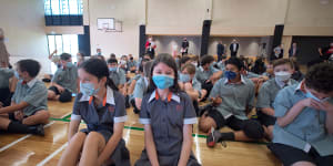 Masked Port Melbourne Secondary College students on Monday - their first day at school for 2022. 