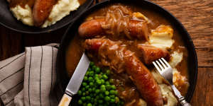 Comfort food classic:Bangers and mash with a rich onion gravy.