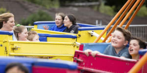 Families enjoy a ride at Our Lady’s Ringwood school fete. 