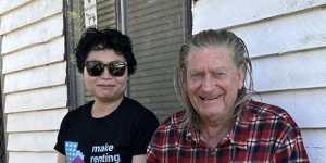 Tenants Union of NSW strategic litigation solicitor Cass Wong and Joey Warren outside his Catherine Hill Bay home.