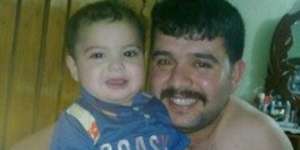 Ghanim al-Shnen with his son Ali in Iraq. 