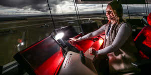 Kristen Roe,enroute air traffic controller,behind the console at Tullamarine tower.