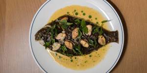 Whole kelp flounder with pickled mussels,warrigal greens and aniseed myrtle.