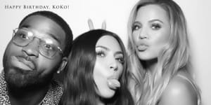 Tristan Thompson with Kim Kardashian and Khloe Kardashian (far right).