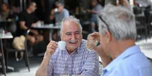 Gregory Liakatos shares a Greek coffee with lifelong friend James Kaloumeris at Eaton Mall in Oakleigh.