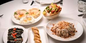 A selection of home-style Lebanese dishes at Abla's including mixed dips,fattoush,chicken and rice,baklava and silverbeet rolls.