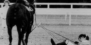 Prince Charles takes a fall at Warwick Farm in 1983 in front of a crowd of 10,000 Australians. He was unhurt and later joked about the incident.