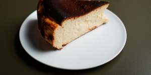 Basque cheesecake is served simply,with no adornment beyond its blackened crust.