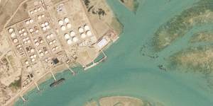 An oil tanker docked at Bandar Mashahr,Iran in February appears to be taking on Iranian crude oil in violation of American sanctions.