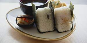 The Onigiri rice ball set comes with comes with miso soup,two seaweed-wrapped sushi rice balls and sweet and savoury rolled omelette. 