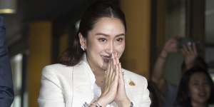 Daughter of Thailand’s former divisive leader becomes country’s new PM