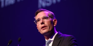 NSW Premier Dominic Perrottet speaks at the Sydney Summit at the ICC in Sydney on Monday.
