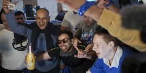 Supporters of Benjamin Netanyahu,former Israeli Prime Minister and the head of Likud party celebrates the first exit poll results for Israel’s election,at the Likud party headquarters in Jerusalem. 