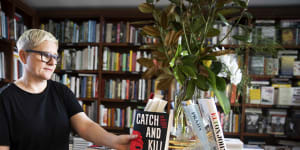 Anna Low,the owner,stacks the shelves at Potts Point Bookshop.