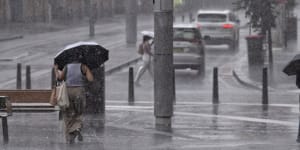 Flash flooding as rain drenches Sydney for second day