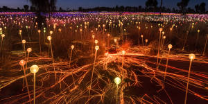 Which Australian landmark will you find near the Field of Light desert art installation?