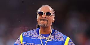 Snoop Dogg has been hired by the AFL to perform at the grand final on September 27.