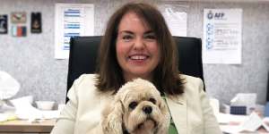 The late senator and childhood friend of Chloe Shorten,Kimberley Kitching,with her Cavoodle,Nancy-Jane.