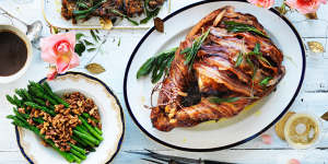 The bacon-wrapped roast turkey centrepiece (with pumpkin and fruit mince stuffing,top).